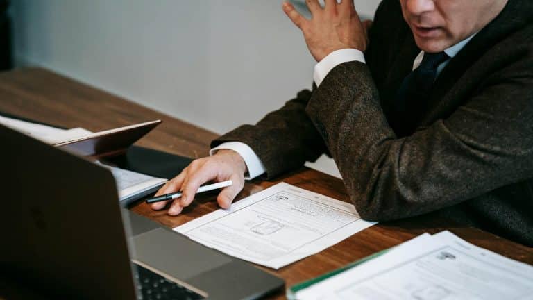 A teacher thoroughly assesses work after completing their assessor award.