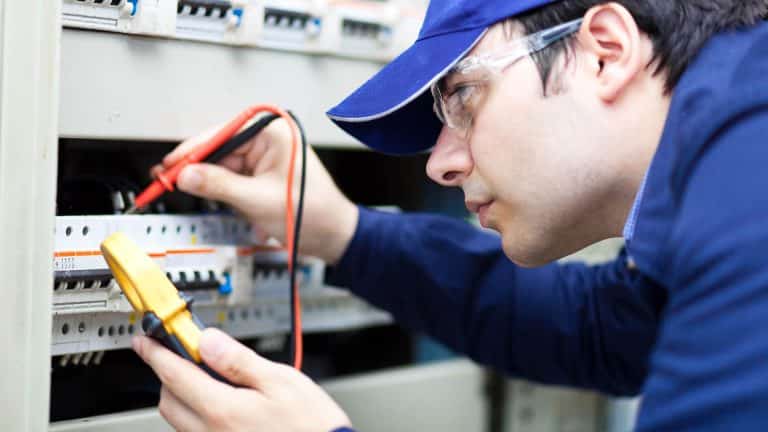 An electrician on the City & Guilds 2382-22 18th Edition course